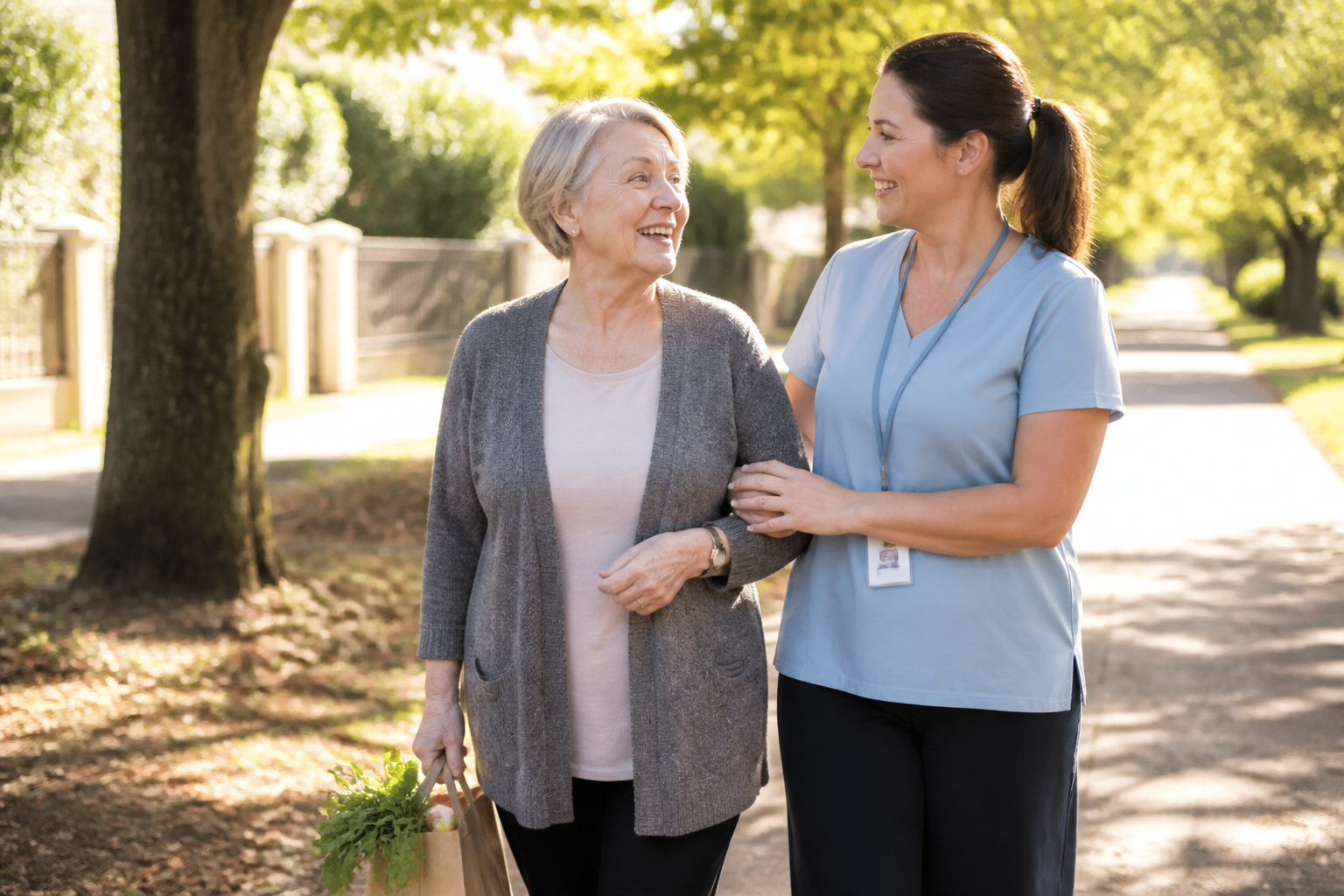 A support worker walking outdoors with a participant